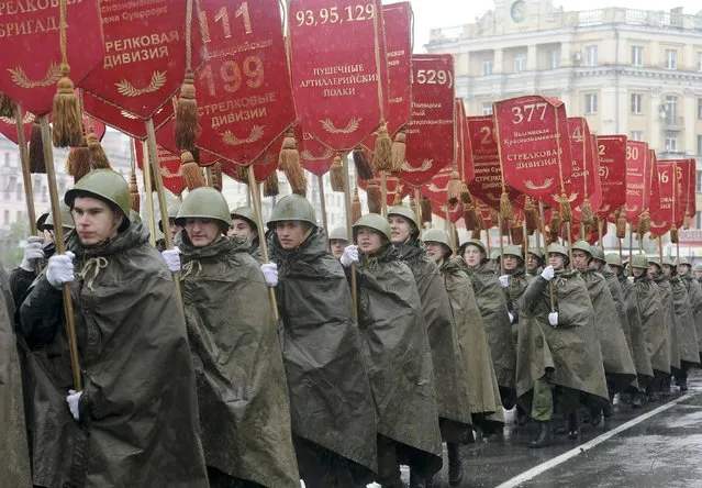 Participants dressed in historical uniform march during the celebrations for Victory Day in Chelyabinsk, Russia, May 9, 2015. (Photo by Reuters/Host Photo Agency/RIA Novosti)