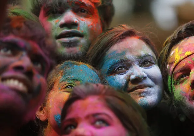 People pose for a selfie while celebrating Holi in Mumbai, India March 24, 2016. (Photo by Shailesh Andrade/Reuters)