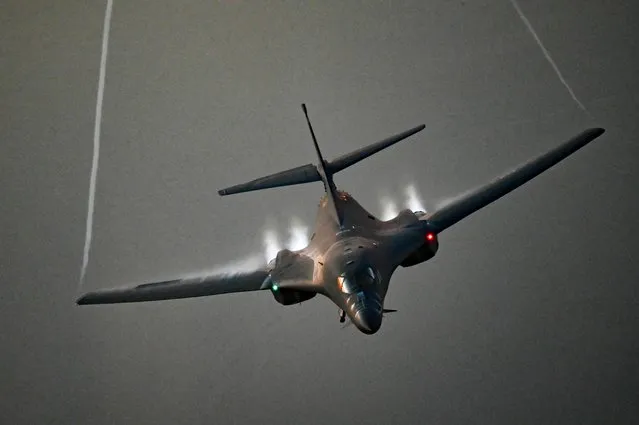 In this photo released by the U.S. Air Force, a B-1B Lancer flies over the Persian Gulf Saturday, October 30, 2021. The U.S. Air Force said Sunday it flew a B-1B strategic bomber over key maritime chokepoints in the Mideast with allies including Israel amid ongoing tensions with Iran as its nuclear deal with world powers remains in tatters. (Photo by Senior Airman Jerreht Harris/U.S. Air Force via AP)