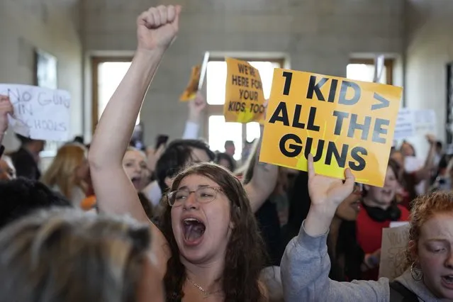 Emmie Wolf-Dubin, center, yells during a protest outside the House chamber after legislation passed that would allow some teachers to be armed in schools during a legislative session Tuesday, April 23, 2024, in Nashville, Tenn. (Photo by George Walker IV/AP Photo)