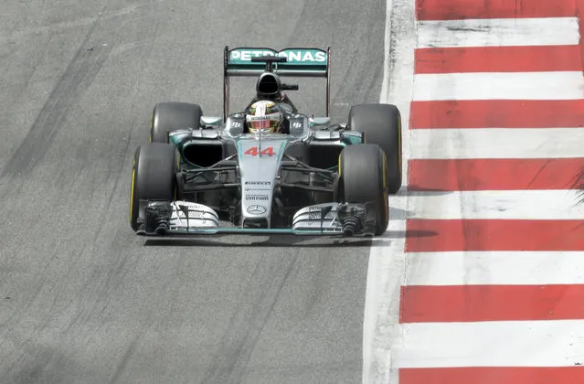 Second placed Mercedes driver Lewis Hamilton of Britain steers his car during the Austrian Formula One Grand Prix race at the Red Bull Ring  in Spielberg, southern Austria, Sunday, June 21, 2015. (AP Photo/Kerstin Joensson)