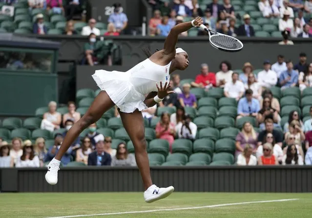 Coco Gauff of the US serves to Russia's Elena Vesnina during the women's singles second round match on day four of the Wimbledon Tennis Championships in London, Thursday July 1, 2021. (Photo by Alberto Pezzali/AP Photo)
