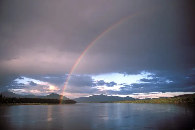 A rainbow is seen over the Yukon River in Eagle, Alaska in this undated handout photo courtesy of the U.S. Geological Society. Alaska has banned fishing for king salmon in the Yukon River in the summer of 2014, saying that runs could come in even lower than 2013's historically low numbers amid a 10-year decline. (Photo by Reuters/U.S. Geological Society)