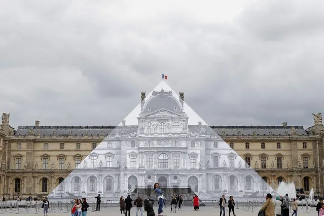 Tourists walk around theJR project at the Louvre Pyramid in Paris, Tuesday, May 24, 2016. For his latest bold project, street artist JR is creating an eye-tricking installation at the Louvre Museum that makes it seem as if the huge glass pyramid at the heart of the courtyard has disappeared. (Photo by Francois Mori/AP Photo)