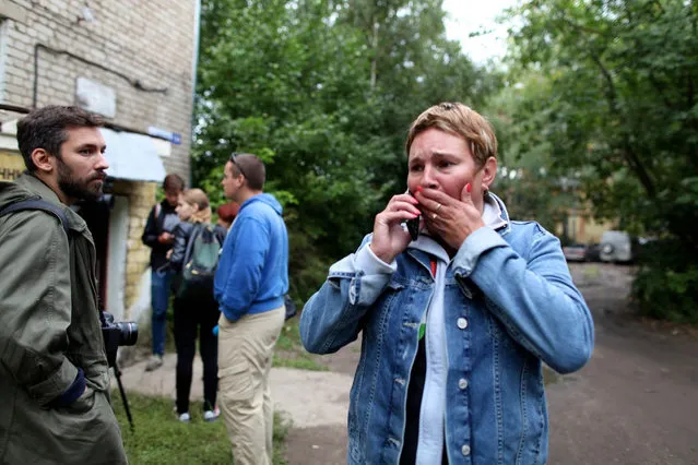 In Kostroma, Russia, Olga Garina, the mother of one of the Russian paratroopers captured in Ukraine, gets a call telling her all of the paratroopers are safe, on August 28, 2014. (Photo by Karoun Demirjian/The Washington Post)