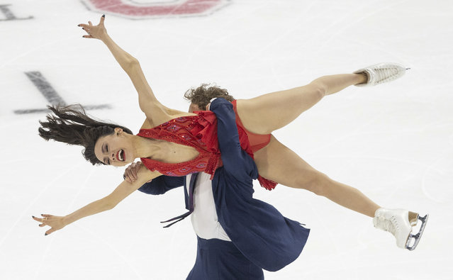 Madison Chock, top, and Evan Bates, bottom, perform during the ice dance rhythm dance competition at the U.S. figure skating championships Friday, January 24, 2025, in Wichita, Kan. (Photo by Travis Heying/AP Photo)