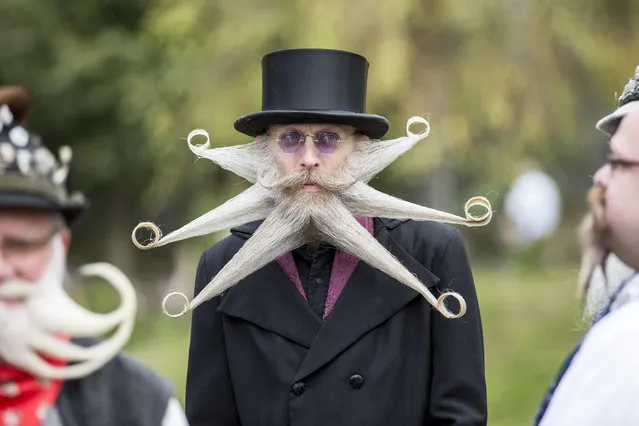 A contestant of the World Beard And Mustache Championships poses for a picture during the opening ceremony of the Championships 2015 on October 3, 2015 in Leogang, Austria. (Photo by Jan Hetfleisch/Getty Images)