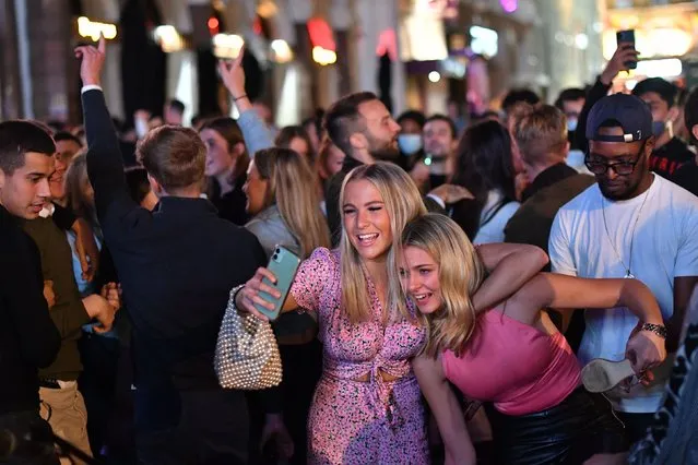 People enjoying a night out in Leicester Square in London's West End on September 12, 2020. People have been warned against having a “party weekend” as a former chief scientific adviser said the UK is “on the edge of losing control” of coronavirus. The public has been urged to act “in tune” with Covid-19 guidelines before the ”rule of six” restrictions come into force on Monday. (Photo by Dominic Lipinski/PA Images via Getty Images)