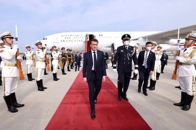 French President Emmanuel Macron arrives at Beijing Capital International Airport in Beijing, capital of China, April 5, 2023. At the invitation of Chinese President Xi Jinping, French President Emmanuel Macron arrived in Beijing on Wednesday afternoon for a state visit to China through Friday. (Photo by Liu Bin/Xinhua/Alamy Live News)