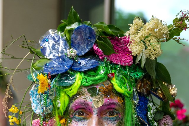 An environmental activist in a costume takes part in the 'Restore Nature Now' march in London, Britain, 22 June 2024. More than 350 environmental groups including the National Trust, Royal Society for the Protection of Birds (RSPB) and Extinction Rebellion (XR) are marching through London on 22 June to demand the British government to address the climate and ecological crisis. (Photo by Maja Smiejkowska/EPA/EFE)