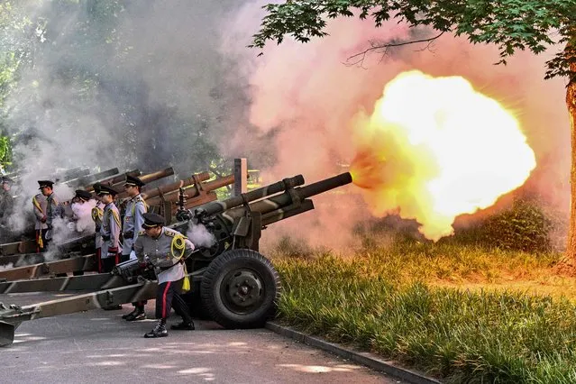 Cannons fire a twenty-one gun salute at the National Cemetery as South Korea marks Memorial Day, which honours those who died during the 1950-53 Korean War and in other operations while serving their country, in Seoul on June 6, 2023. (Photo by Anthony Wallace/AFP Photo)