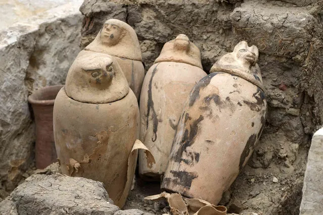 Canopic jars, which were made to contain organs that were removed from the body in the process of mummification, are seen at the site of the Step Pyramid of Djoser in Saqqara, 24 kilometers (15 miles) southwest of Cairo, Egypt, Saturday, May 27, 2023. Saqqara is a part of Egypt's ancient capital of Memphis, a UNESCO World Heritage site. (Photo by Amr Nabil/AP Photo)