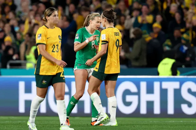 Ireland's midfielder Ruesha Littlejohn (L) speaks to Australia's forward #09 Caitlin Foord after the Australia and New Zealand 2023 Women's World Cup Group B football match between Australia and Ireland at Stadium Australia, also known as Olympic Stadium, in Sydney on July 20, 2023. (Photo by David Gray/AFP Photo)
