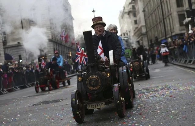 People ride model steam engines during the New Year's day parade in London, Britain January 1, 2017. (Photo by Neil Hall/Reuters)