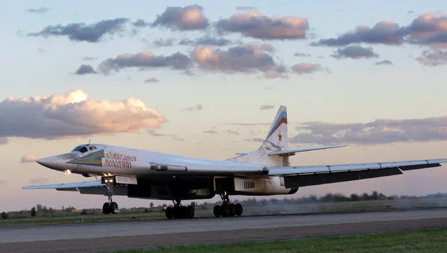 In this file photo taken on Friday, September 12, 2008, Russia's strategic bomber Tu-160 or White Swan, the largest supersonic bomber in the world, lands at Engels Air Base near Saratov, about 700 kilometers (450 miles) southeast of Moscow, Russia. The Russian military says two of its nuclear-capable strategic bombers have arrived in Venezuela, a deployment that comes amid soaring Russia-U.S. tensions. (Photo by Misha Japaridze/AP Photo)