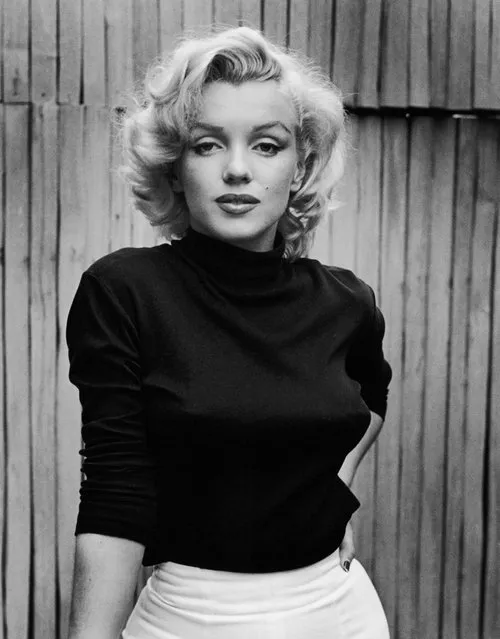 Portrait of American actress Marilyn Monroe (1926 - 1962) as she poses on the patio outside of her home, Hollywood, California, May 1953. (Photo by Alfred Eisenstaedt/The LIFE Picture Collection/Getty Images)