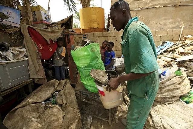 A man brings plastic materials to a recycling station in Khartoum North April 16, 2015. (Photo by Mohamed Nureldin Abdallah/Reuters)