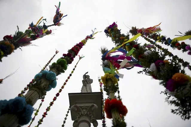 Traditional palms, made of wicker twigs and decorated with colourful flowers and ribbons are pictured during the Catholic Palm Sunday procession and traditional contest for the largest handmade palm in Lipnica Murowana near Krakow, southern Poland, March 20, 2016. (Photo by Lukasz Krajewski/Reuters/Agencja Gazeta)