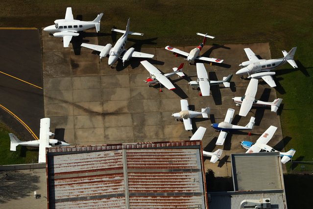 Aircraft are seen parked up at Essendon Airport on August 26, 2020 in Melbourne, Australia. Melbourne is in stage four lockdown for six weeks until September 13 after sustained days of high new COVID-19 cases. (Photo by Robert Cianflone/Getty Images)