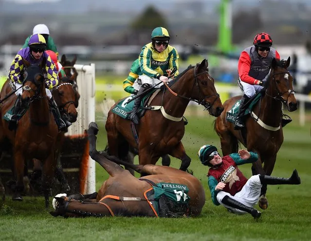 Brian Hughes is unseated from Urban Hymn in The Gaskells Waste Management Handicap Hurdle Race during the 2016 Crabbie's Grand National Steeple Chase at Aintree Racecourse on April 9, 2016 in Liverpool, England. (Photo by Laurence Griffiths/Getty Images)
