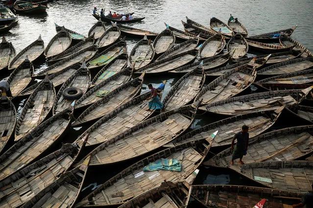 Boats are anchored at the bank of the river Buriganga which are used to carry passengers crossing the river in Dhaka, Bangladesh, June 12, 2019. (Photo by Mohammad Ponir Hossain/Reuters)