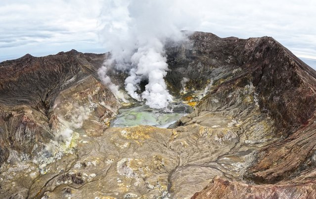 This handout pictured released by the GNS Science on August 22, 2024, shows steam rising from the White Island volcano in Whakatane after a volcanic eruption off the coast from Whakatane on the North Island. (Photo by GNS Science/Handout via AFP Photo)