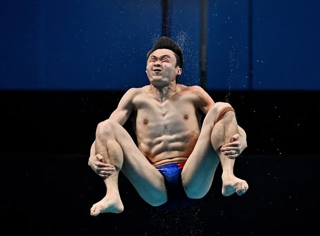 China's Cao Yuan competes to take silver in the men's 3m springboard diving finals at the Duna Arena in Budapest on June 28, 2022. (Photo by Marton Monus/Reuters)