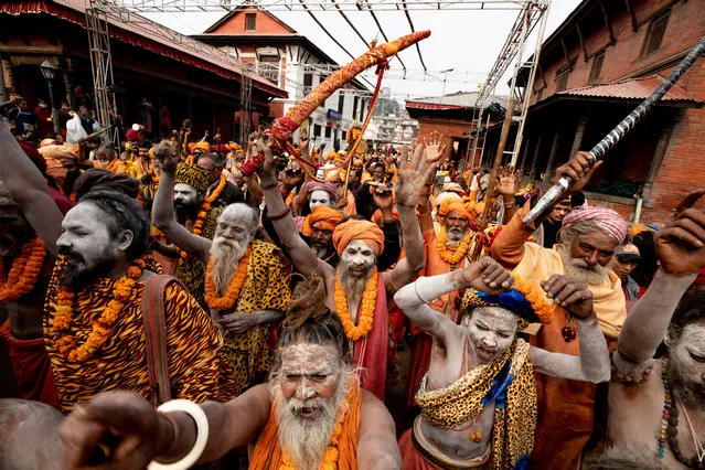 A group of Sadhus, Hindu holy people, take part in a religious rally to mark the annual Hindu festival of Maha Shivratri, at Pashupati Temple in Kathmandu, Nepal, 19 February 2020. Maha Shivratri festival, which is celebrated on 21 February, sees Hindu devotees, from across the country and neighboring India, gather to celebrate the birthday of Lord Shiva, the Hindu god of creation and destruction, by offering special prayers and fasting. (Photo by Narendra Shrestha/EPA/EFE)