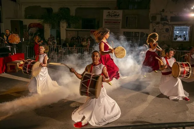 Street artists perform at the “Artists in our neighborhood” festival in Tunis, Tunisia on June 30, 2022. (Photo by Yassine Gaidi/Anadolu Agency via Getty Images)