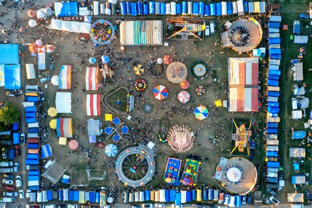 An aerial view from Pavli Fair established in Pehlivankoy for the 114 years, in Kirklareli, Turkiye on September 15, 2024. “Pavli Fair”, which started to be established in 1910 with the edict of Sultan AbdUlhamit II, in Pehlivankoy, in order to ensure the unity and solidarity of the people of the region, welcomes its guests. The fairground includes an amusement park, open-air restaurants and sales areas. (Photo by Murat Bakmaz/Anadolu via Getty Images)