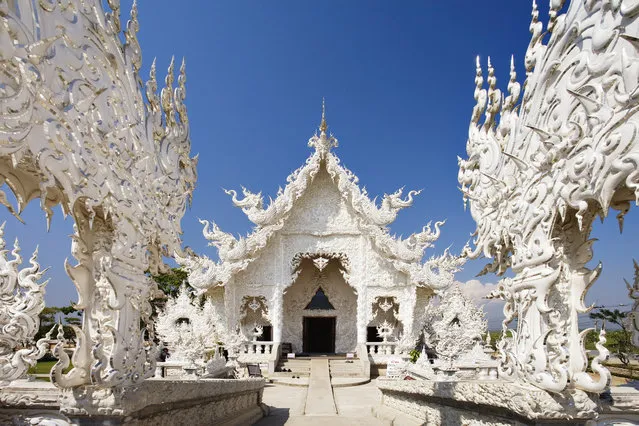 Wat Rong Khun, created by artist Chalermchai Kositpipat and located in central Thailand (Tambon Pa-or Donchai, Mueang District). Wat Rong Khun is being built to imitate heaven on earth; the white color represents the purity of Buddha. Location: Tambon Pa-or Donchai, Thailand. (Photo by William Manning via Getty Images)