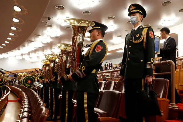Military band members rehearse before the opening ceremony of the 20th National Congress of the Communist Party of China at the Great Hall of the People in Beijing, China on October 16, 2022. (Photo by Thomas Peter/Reuters)