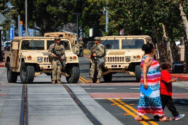 Members of the California National Guard are deployed outside a complex of federal buildings in Santa Ana, California on June 18, 2025. (Photo by Mike Blake/Reuters)