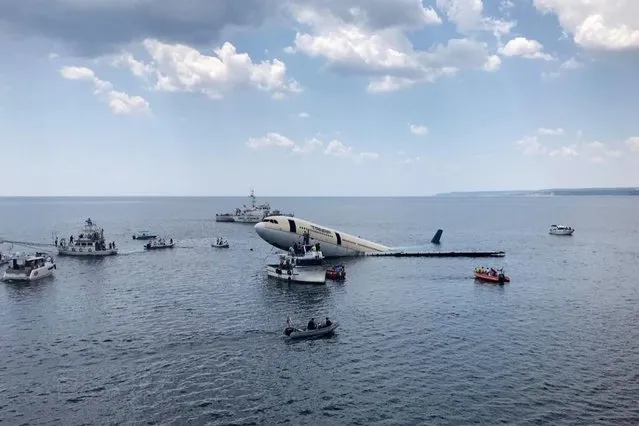 Sinking of an Airbus A330 jet is underway near Ibrice port in Turkey's northwestern Edirne province on June 14, 2019. With the contributions of Trans Anatolian Natural Gas Pipeline Project (TANAP) the plane is being sunken a mile away from the coast in a depth of 30 meters to revive diving tourism and turn the plane into an artificial reef at Gulf of Saros. Plane parts were brought from Antalya with six trucks. (Photo by Cihan Demirci/Anadolu Agency/Getty Images)
