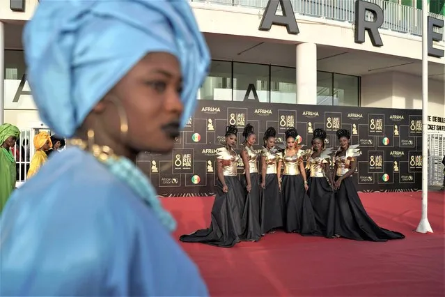 Hostess pose for a picture at the Afrima, All Africa Music Awards, held at the Dakar Arena in Diamniadio, Senegal, Sunday, January 15, 2023. (Photo by Leo Correa/AP Photo)