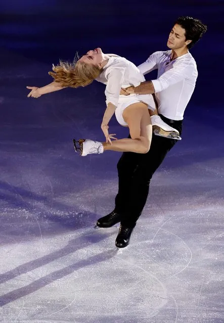 Gold medallists Kaitlyn Weaver and Andrew Poje of Canada performs during the exhibition gala at the ISU Grand Prix of Figure Skating in Barcelona, December 14, 2014. (Photo by Gustau Nacarino/Reuters)
