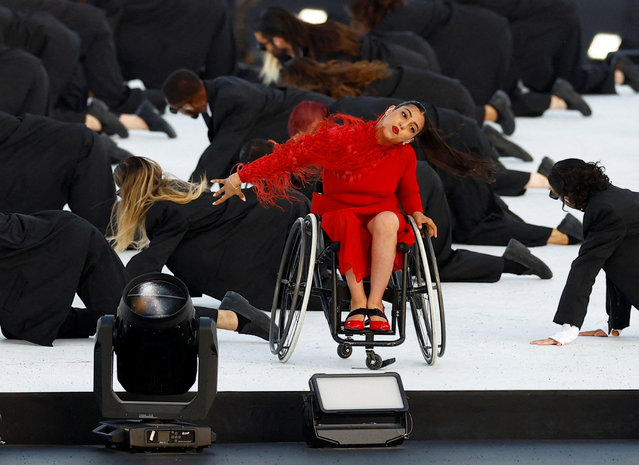 Dancers perform during the Paris 2024 Paralympic Games Opening Ceremony at the Place de la Concorde in Paris on August 28, 2024. (Photo by Carlos Garcia Rawlins/Reuters)