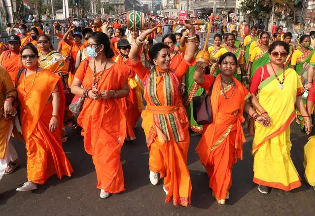 Women attend a protest march against the rise in fuel prices on the occasion of International Women's Day in Kolkata, India, March 8, 2021. (Photo by Rupak De Chowdhuri/Reuters)