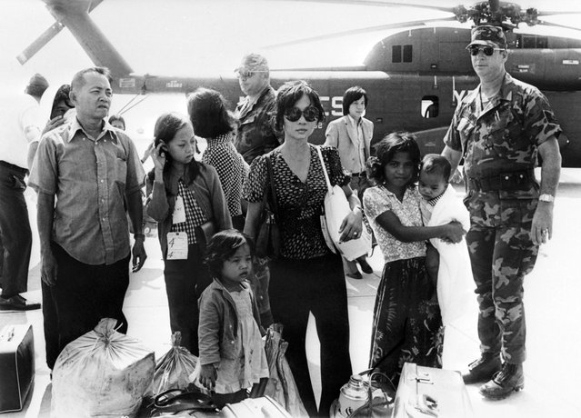 Picture released on April 16, 1975 of Cambodian refugees arriving at the US military base of Utapao, Thailand, as Cambodian civils flee the Cambodian war. (Photo by AFP Photo/Stringer)