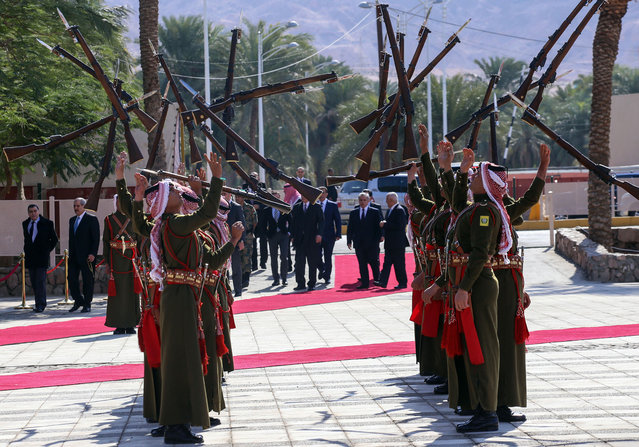 Jordanian honor guards put on a show during a ceremony marking the 100th anniversary of the Great Arab Revolt against the regions ruling Ottoman Turks, January 23, 2016 in the southern city of Aqaba, Jordan. Upon a directive by the King, Great Arab revolt centennial celebrations will be held countrywide throughout 2016 at both popular and official levels. (Photo by Raad Adayleh-Pool/Getty Images)