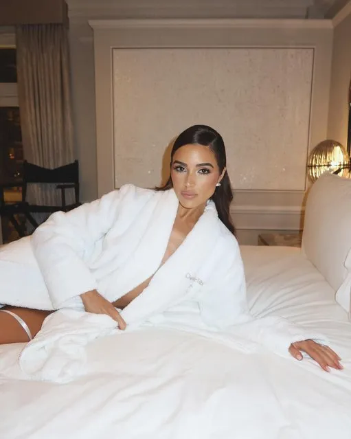 American model Olivia Culpo in the first decade of December 2023 lounges in a plush robe. (Photo by Oliviaculpo/Instagram)