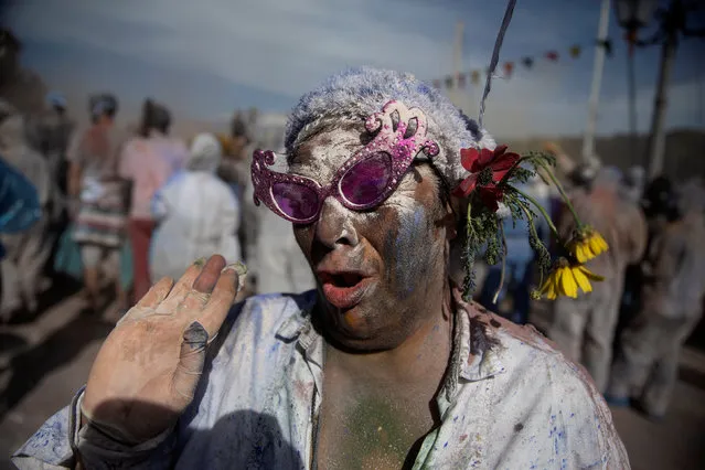 A reveller celebrates “Ash Monday” by participating in a colourful “flour war”, a traditional festivity marking the end of the carnival season and the start of the 40-day Lent period until the Orthodox Easter, in the port town of Galaxidi, Greece, March 11, 2019. (Photo by Alkis Konstantinidis/Reuters)