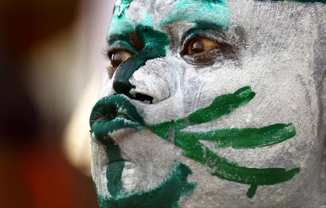 A Nigeria fan is pictured inside the stadium before the Africa Cup of Nations Nigeria v South Africa match at Stade de la Paix in Bouake, Ivory Coast on February 7, 2024. (Photo by Siphiwe Sibeko/Reuters)