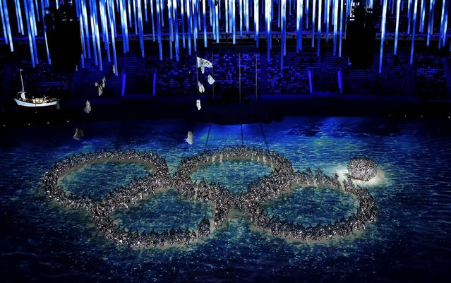 Performers recreate the fifth Olympic ring that didn't open in the opening ceremony during the closing ceremony of the 2014 Winter Olympics. (Photo by David J. Phillip/Associated Press)