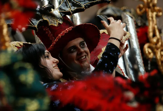 Revellers take a selfie during the carnival street parade in Valletta, Malta, February 25, 2017. (Photo by Darrin Zammit Lupi/Reuters)