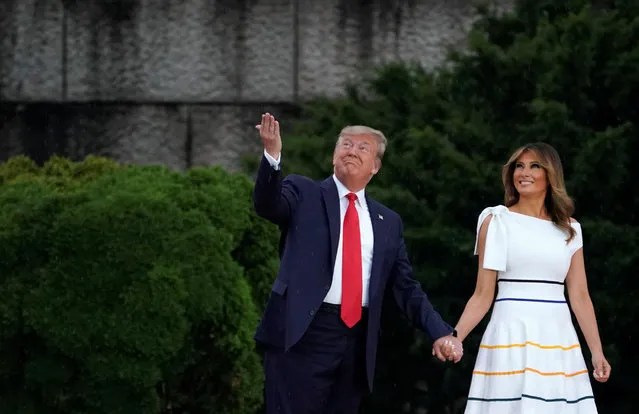 U.S. President Donald Trump and and first lady Melania Trump arrive for the “Salute to America” event at the Lincoln Memorial during Fourth of July Independence Day celebrations in Washington, D.C., U.S., July 4, 2019. (Photo by Joshua Roberts/Reuters)