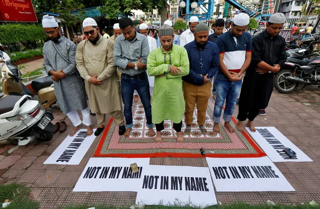 Muslims offer prayers as they take part in a protest against the recent cases of mob lynchings of Muslims who were accused of possessing beef, in Kolkata, India June 28, 2017. (Photo by Rupak De Chowdhuri/Reuters)