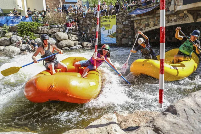 Teams battle it out during the Pacifico Raft Cross at the GoPro Mountain Games on Friday, June 10, 2022 n Vail, Colo. (Photo by Chris Dillmann/Vail Daily via AP Photo)