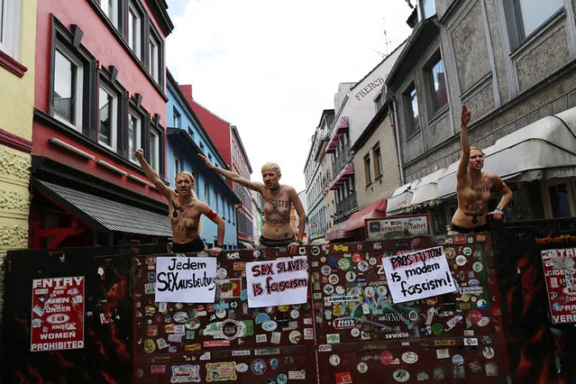 FEMEN Makes Hitler-like March Through Hamburg's Popular Red-light District