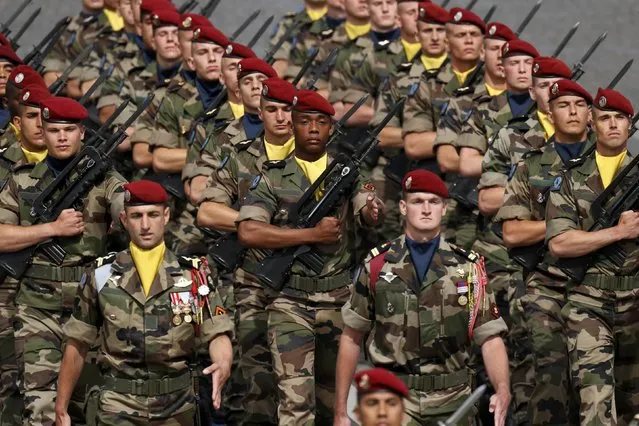 Troops from Operation Sangaris attend the Bastille Day military parade on the Champs Elysees in Paris, France, July 14, 2016. (Photo by Benoit Tessier/Reuters)